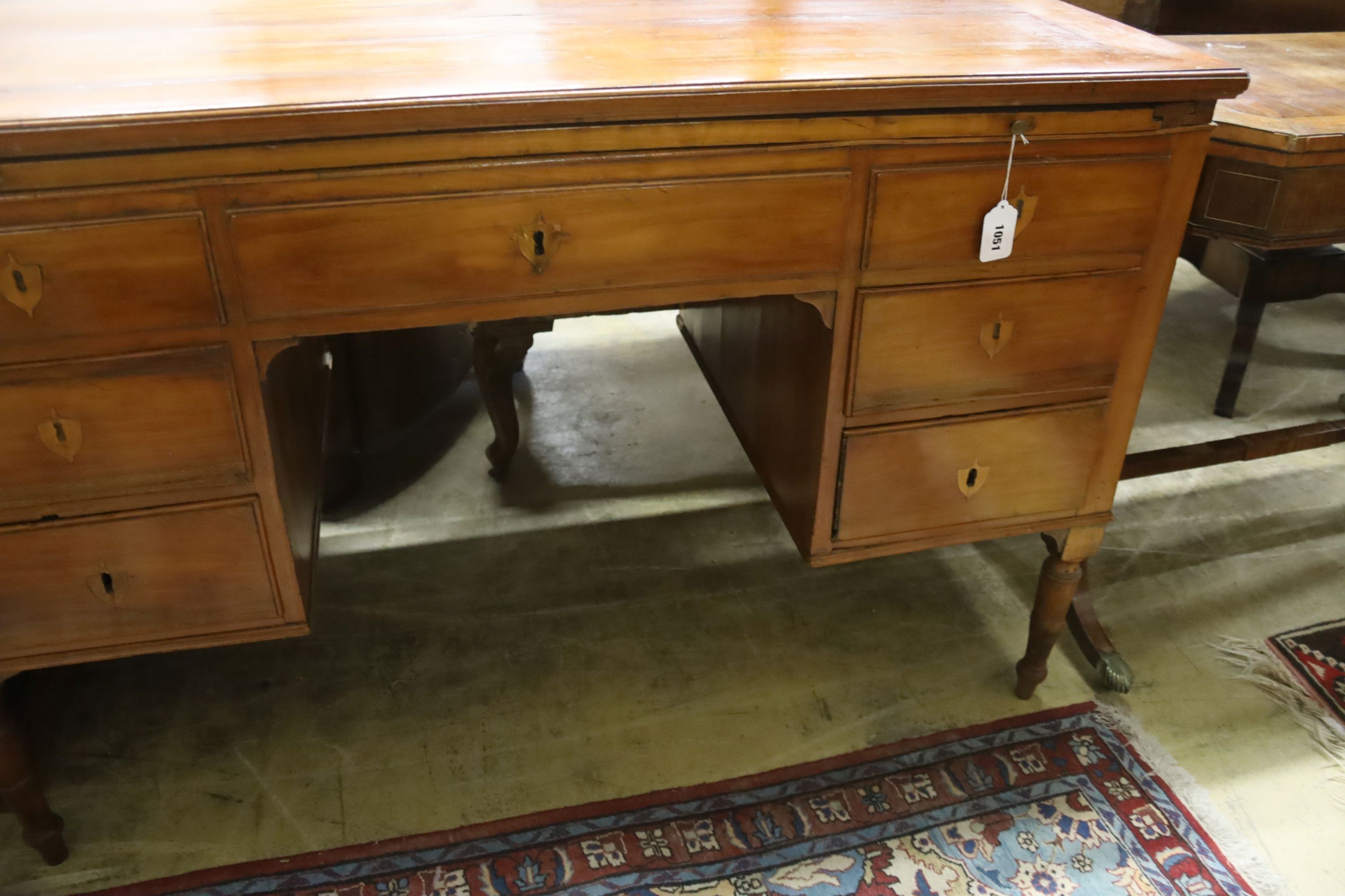 A late 19th/ early 20th century Italian walnut kneehole desk, width 122cm, depth 60cm, height 79cm